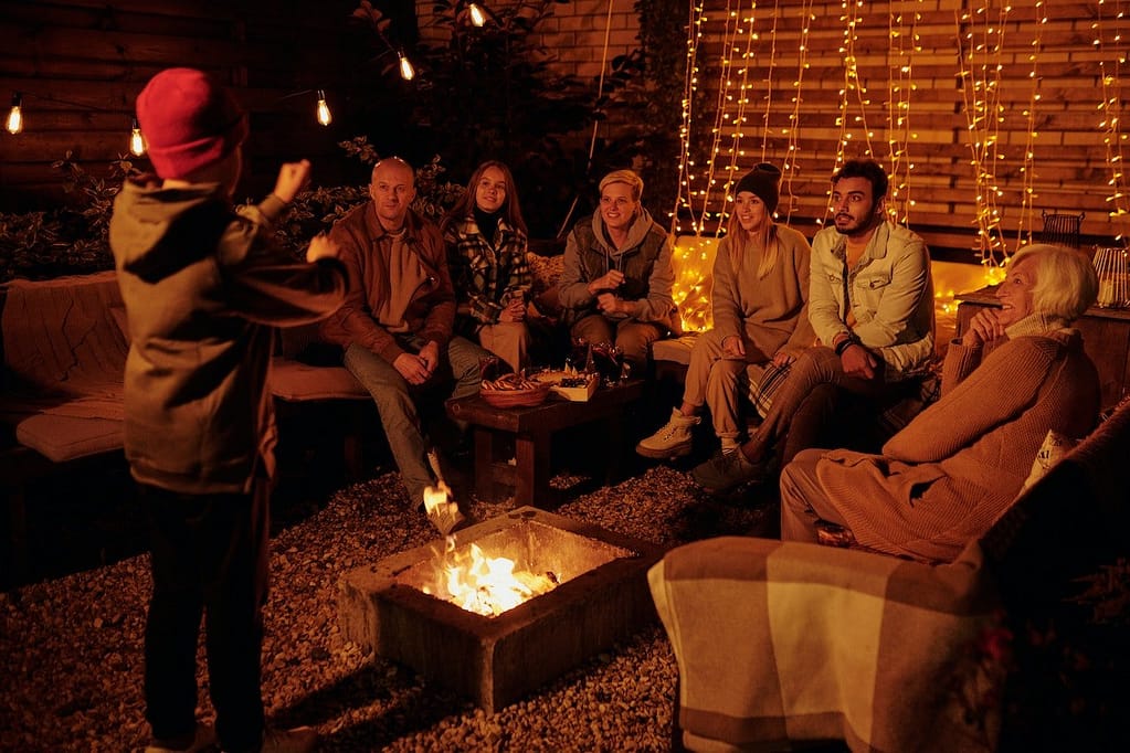 Family playing charades a fun campfire game