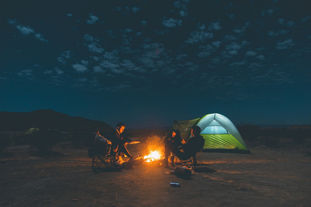 Camping with friends at clear night