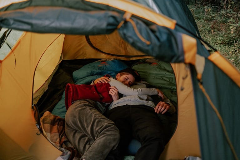 2 person inside a tent