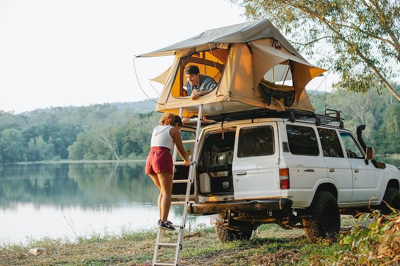 Two People in roof top tent